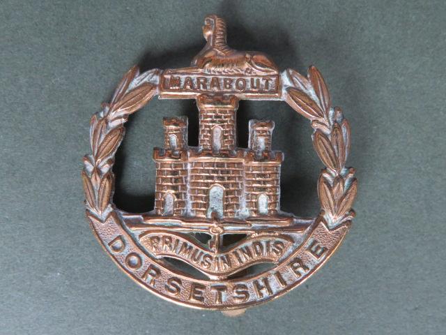 British Army WW1 Economy Issue The Dorsetshire Regiment Cap Badge